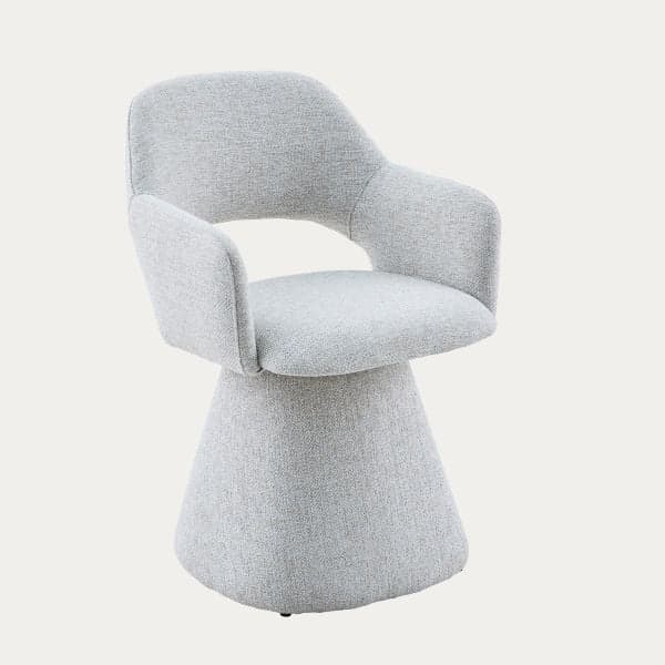A contemporary light grey upholstered chair featuring a rounded backrest, integrated armrests, and a wide, conical pedestal base, all covered in a textured fabric. — 3D model