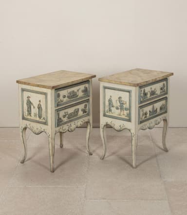 A pair of matching nightstands with two drawers each. The front panels of the drawers and the lower skirt are adorned with hand-painted blue and white scenic details, featuring boats and architectural elements. The nightstands have a distressed cream-colored finish and are supported by four cabriole legs. The top surface appears to be a different material, possibly a veneer or stone. — 3D model