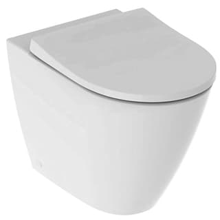 A modern, wall-mounted toilet with a sleek, minimalist design. The toilet features a closed-front bowl and a concealed cistern, typical of contemporary bathroom fixtures. It has a smooth, rounded seat and lid, both in white. The exterior of the toilet is smooth and seamless, suggesting a ceramic material. A small circular indentation is visible on the lower left side of the bowl's exterior. — 3D model