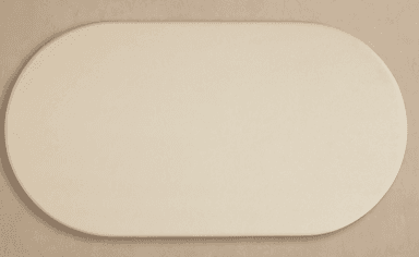 A cream-colored, oval-shaped decorative panel with a smooth, matte finish and softly rounded edges, presented against a subtly textured beige background. The object has a uniform thickness and a minimalist aesthetic. — 3D model