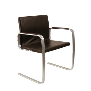 A cantilever armchair with a dark brown leather seat and backrest, supported by a tubular chrome-plated steel frame. The frame features a continuous curve for the legs and arms, creating a minimalist and modern aesthetic. — 3D model