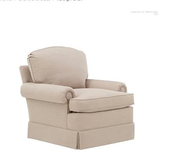 A traditional upholstered armchair featuring a classic silhouette. It has rolled arms, a rounded backrest, and a loose seat cushion. The base is covered with a tailored skirt, giving it a soft and cohesive appearance. The chair is upholstered in a light, neutral-toned woven fabric. — 3D model