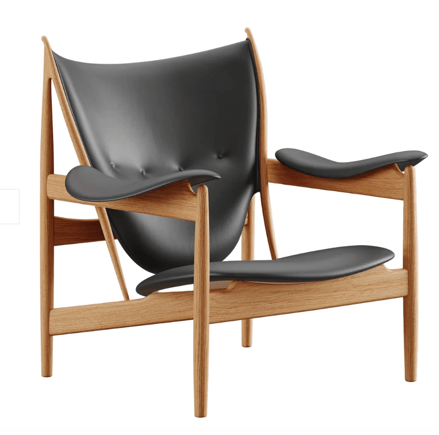 A classic Danish Mid-Century Modern lounge chair featuring a sculpted light-toned wooden frame and dark gray leather upholstery. The design incorporates curved elements for comfort and aesthetic appeal, with exposed joinery and button-tufted details on the backrest. — 3D model