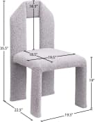 A contemporary fully upholstered chair with an distinctive arch-shaped backrest, rendered in a light gray and white melange textured fabric. The chair features a continuous, seamless form with no visible legs, creating a monolithic and sculptural appearance. — 3D model