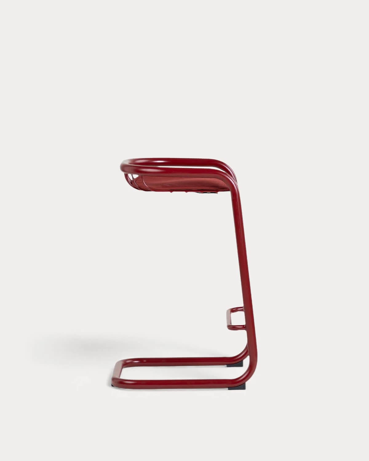 A modern, high-backed bar stool featuring a continuous tubular metal frame with a glossy red finish, an integrated footrest, and a sled base. — 3D model