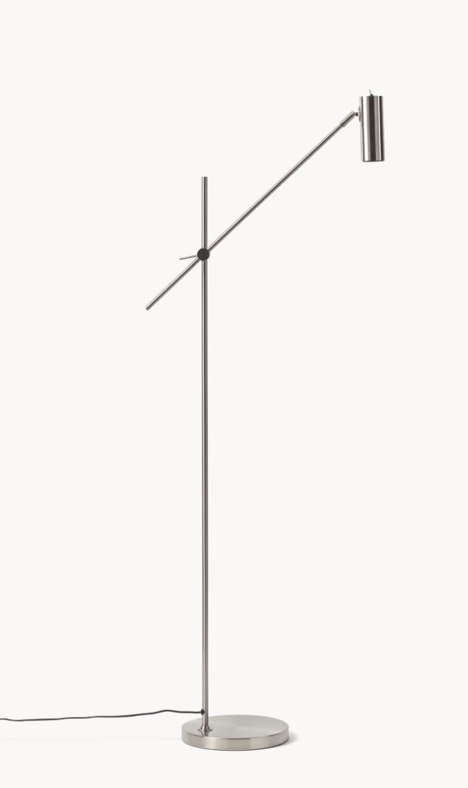 A minimalist floor lamp with a brushed metal finish, featuring a slim vertical stand and an adjustable angled arm that supports a cylindrical lamp head. The base is a flat, circular disc. — 3D model