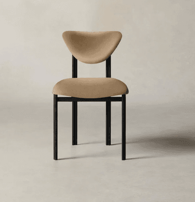 A modern dining chair featuring a matte black tubular metal frame and beige upholstered seat and sculpted backrest. — 3D model