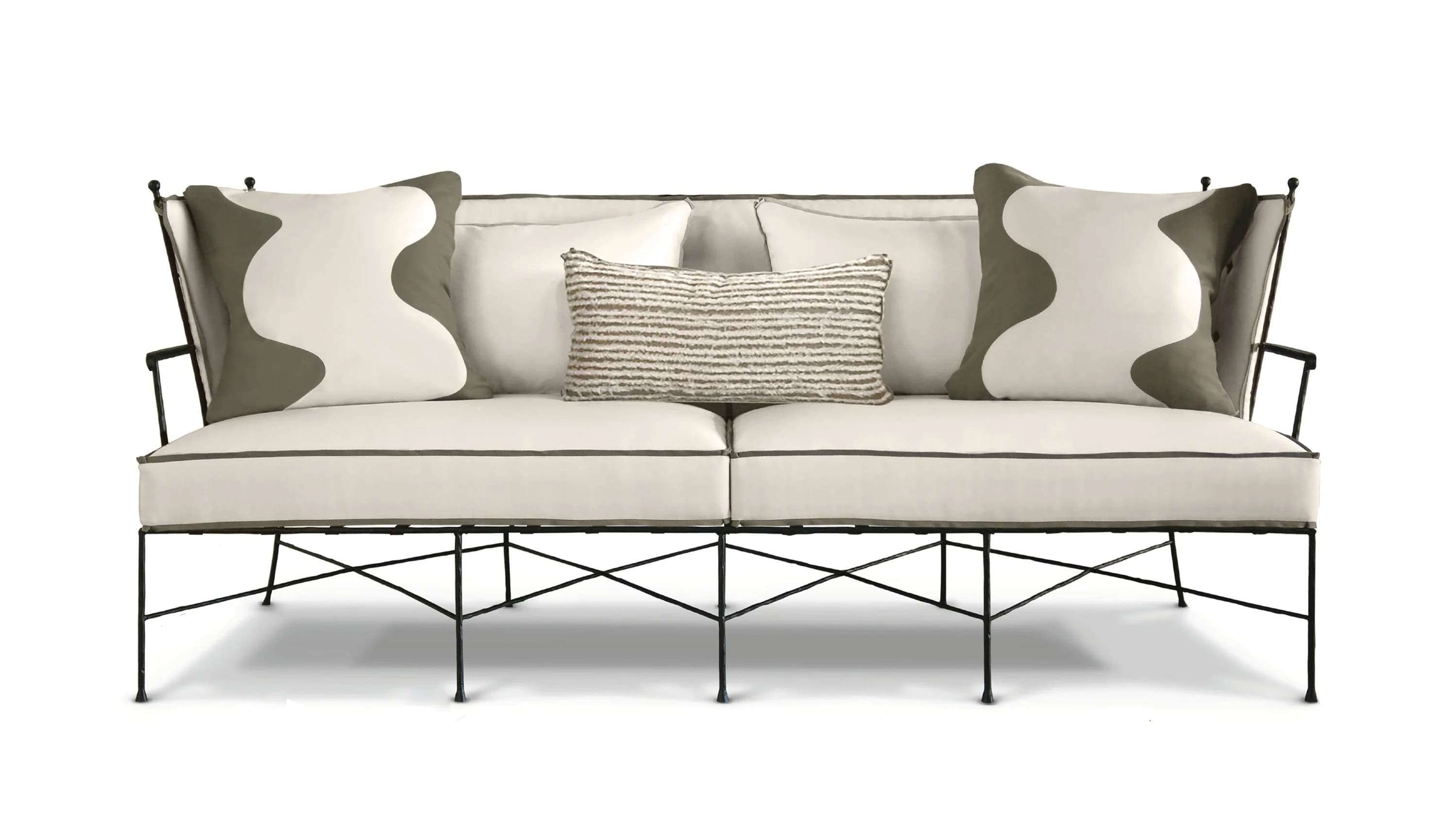 A contemporary sofa with a black metal rod frame, off-white upholstered cushions, and decorative throw pillows. — 3D model