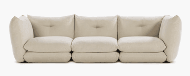 A three-seat sofa with a modular appearance, featuring deep, plush cushions and rounded arms. The back cushions are slightly tufted, and the overall design has a contemporary, comfortable aesthetic. The sofa sits low to the ground with a minimal base. — 3D model