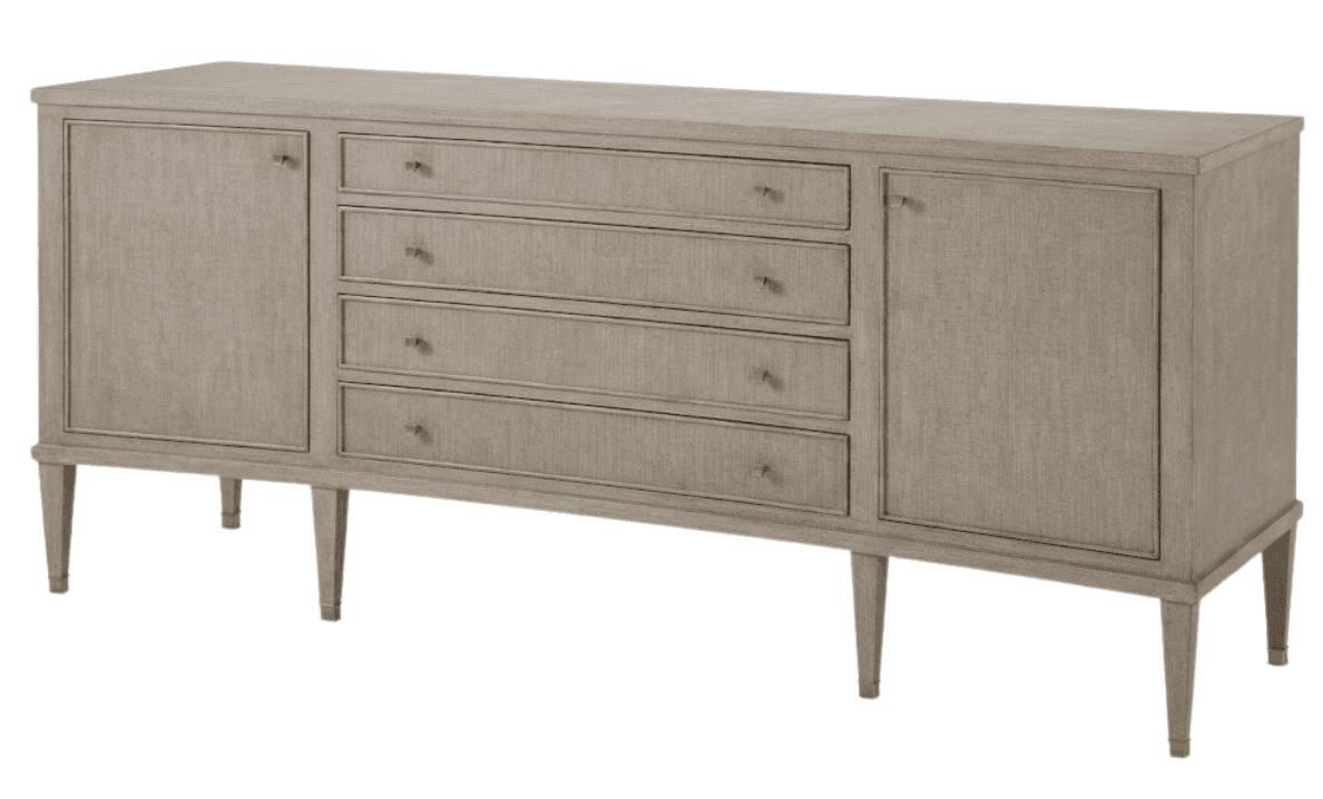 A long, low contemporary sideboard featuring a greige-colored linen or grasscloth-like textured finish. It has two cabinet doors, one on each end, flanking four central drawers. All drawers and doors are equipped with small brass knob pulls. The piece is supported by four slender, tapered legs, each tipped with a brass ferrule. — 3D model