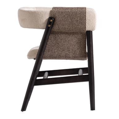 A contemporary armchair featuring a dark-finished wooden frame, upholstered seat and a curved backrest in a light, textured fabric. The backrest wraps around to form partial arms, which are detailed with taupe leather panels secured by exposed brass-toned hardware. The chair stands on four straight, tapered legs. — 3D model