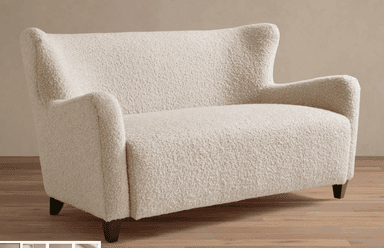 A contemporary two-seater loveseat upholstered in a cream-colored bouclé fabric. It features a high backrest that gently flares outwards at the top, integrated rolled armrests, and a seamless, fully upholstered form. The loveseat is supported by four short, dark, tapered wooden legs. — 3D model