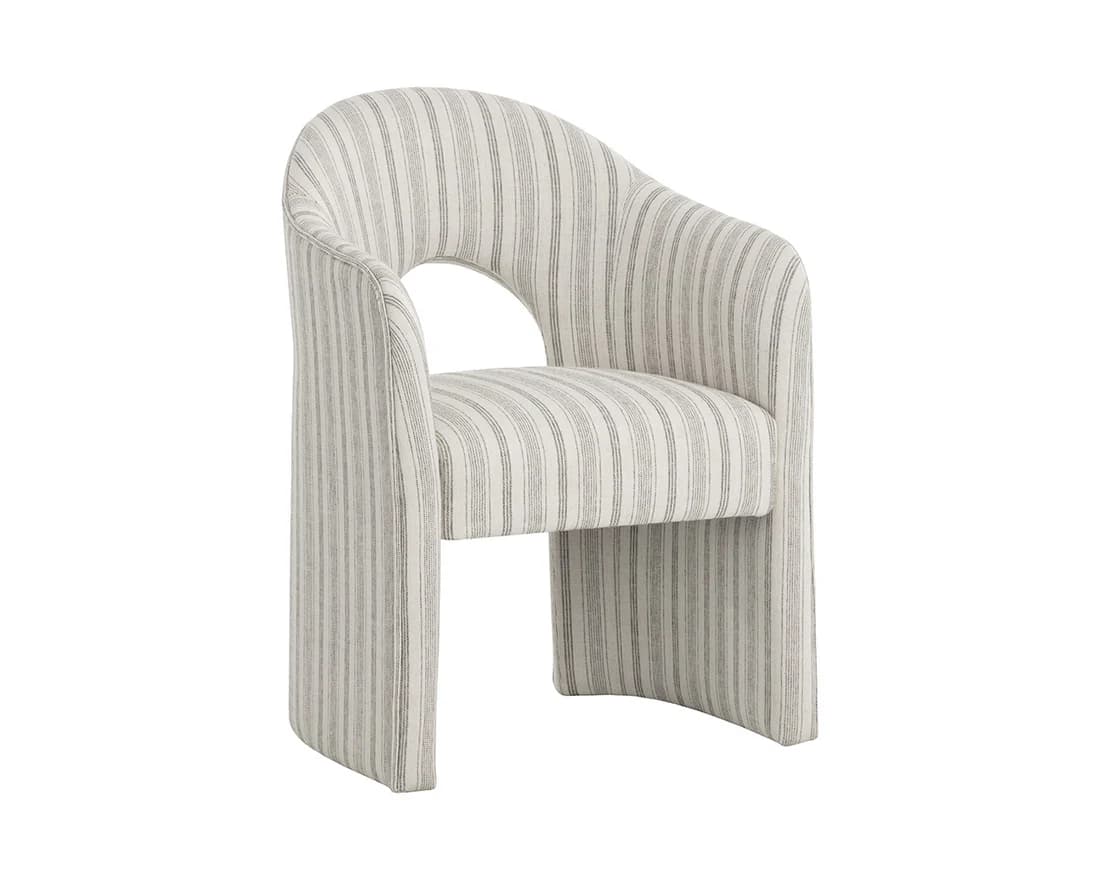 A contemporary upholstered armchair featuring a barrel-back design with integrated arms and a continuous silhouette. The chair is entirely covered in a fabric with a fine vertical pinstripe pattern, alternating light beige/off-white and subtle grey lines. A distinctive semi-circular cut-out is present in the lower backrest, adding a modern design element. The base is fully upholstered, creating a monolithic appearance without exposed legs. — 3D model