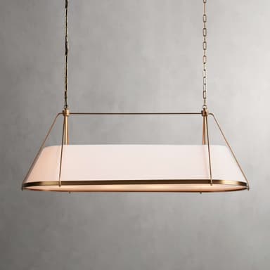 A contemporary linear pendant light featuring a rectangular frosted glass diffuser suspended by a brass-finished metal frame and chains. The light provides diffused illumination. — 3D model
