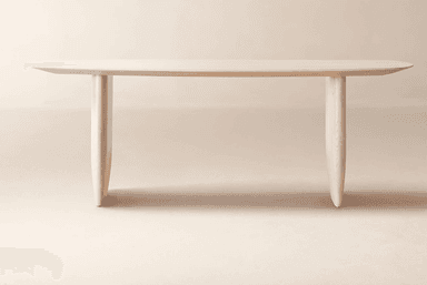 A minimalist console table featuring an elongated oval tabletop supported by two thick, sculptural, rounded legs. The entire piece is crafted from light-toned wood with a smooth, matte finish, giving it an organic and contemporary aesthetic. The design is simple, emphasizing natural forms and materials. — 3D model
