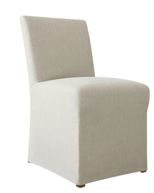 A contemporary armless dining chair fully upholstered in a light, neutral-toned fabric, likely linen or a linen blend. The chair features a straight, high back and a box-like seat structure, giving it a minimalist and tailored appearance. The upholstery extends down to cover the legs, forming a skirted base, with small, discreet wooden feet visible at the very bottom. Its clean lines and monochromatic finish contribute to a versatile aesthetic suitable for various interior designs. — 3D model