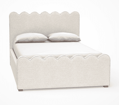 A contemporary upholstered platform bed featuring a distinctive scalloped design on both the headboard and footboard. The bed frame is covered in a light-colored, textured fabric, likely a linen or bouclé blend, and rests on subtle wooden block feet. It includes a mattress and two pillows with white bedding. — 3D model