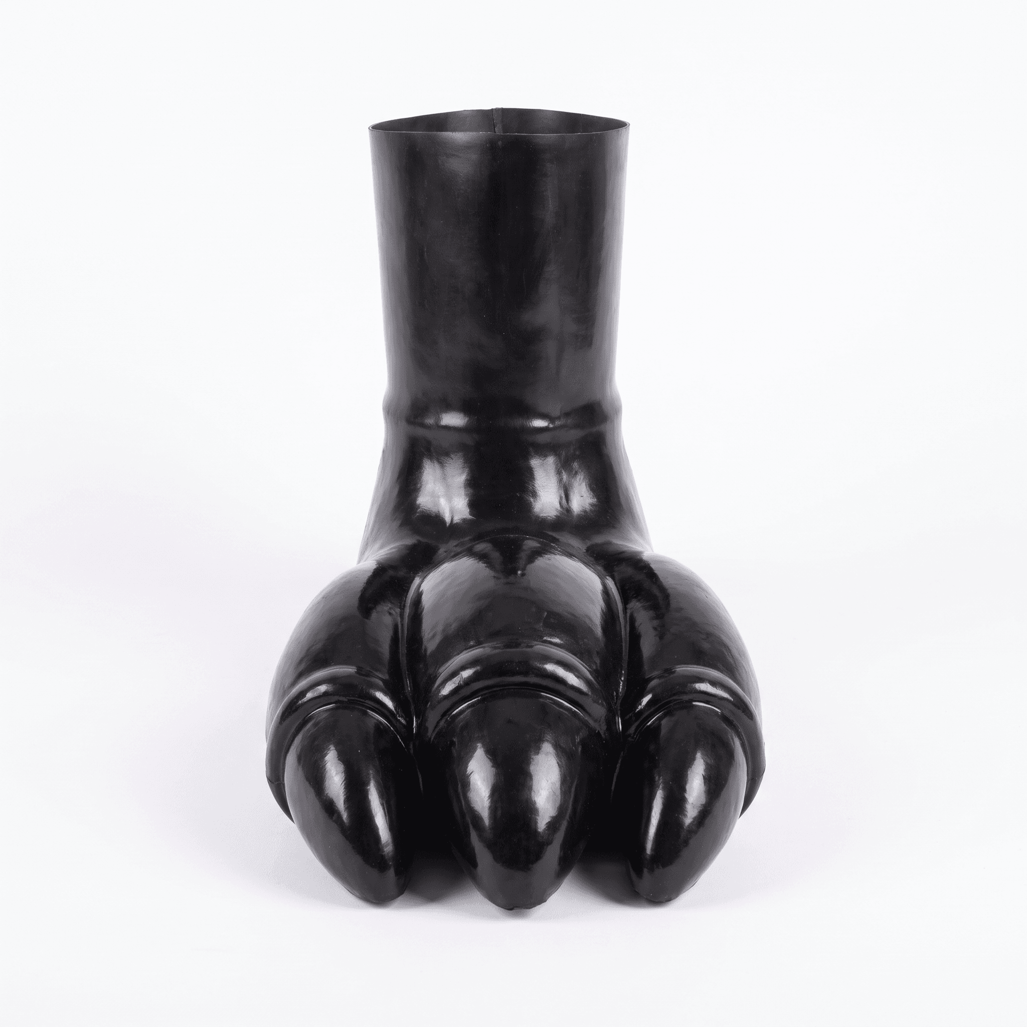A black, glossy decorative object shaped like a large, stylized animal paw or clawed foot, with a cylindrical opening at the top, typically used as a vase or sculptural accent. — 3D model