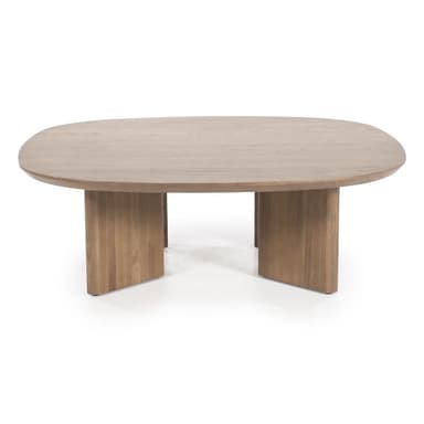 A contemporary coffee table with a rounded, organic-shaped tabletop and thick, block-like legs. The design exhibits a minimalist aesthetic with a focus on material and form. — 3D model