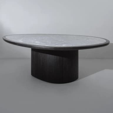A contemporary coffee table featuring an irregular, organic-shaped light marble top supported by a substantial, dark-stained wood pedestal base. The design is minimalist and sculptural. — 3D model