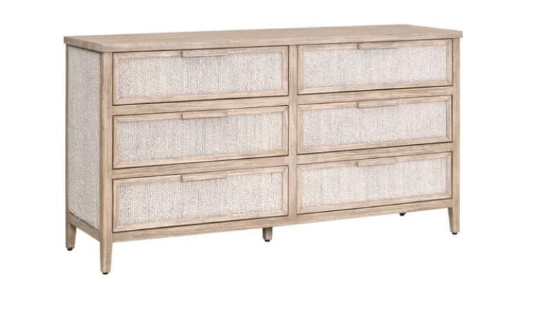 A dresser with a light wood frame and six woven cane drawers, arranged in two columns of three. The dresser has a rectangular top and is supported by four tapered legs. The drawer fronts are integrated into the frame with subtle cut-out handles. — 3D model