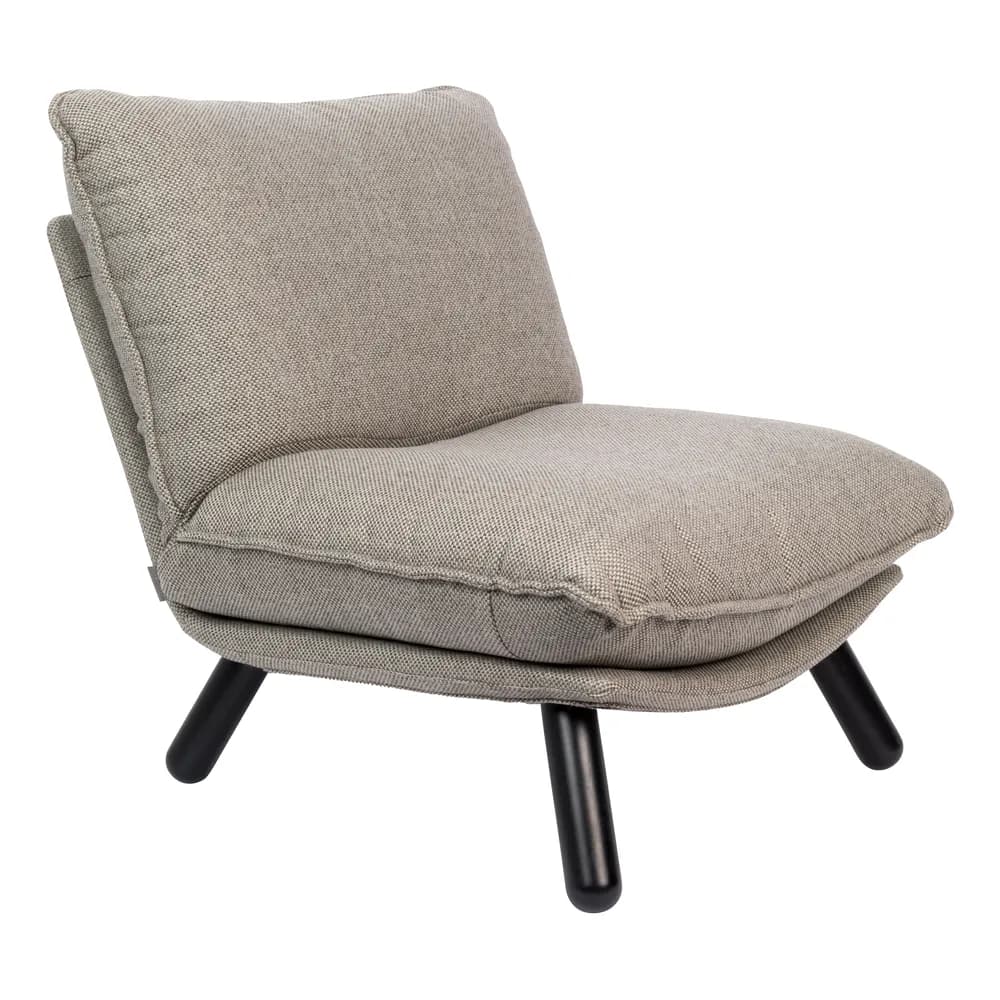 A modern, low-profile armchair with a generously padded seat and backrest. The chair features a sloped back design and is upholstered in a textured, woven fabric. It is supported by four short, cylindrical black legs. — 3D model