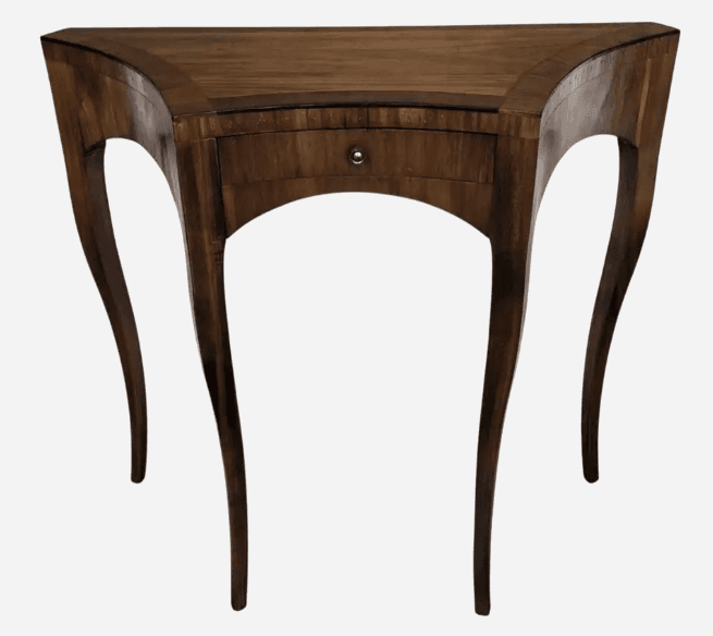 A dark wooden console table with a unique, asymmetrical curved top. It features four cabriole legs that splay outwards. A single drawer is centrally located on the front panel, adorned with a small, round, metallic pull. The wood exhibits a grain pattern that is highlighted by the polished surface. — 3D model