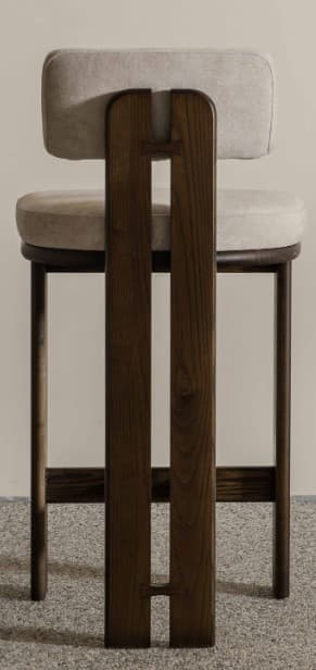 A backless bar stool with a light-colored upholstered seat and backrest, supported by a dark-stained wooden frame. The frame consists of four legs, a crossbar near the bottom for stability, and a visible joinery. — 3D model