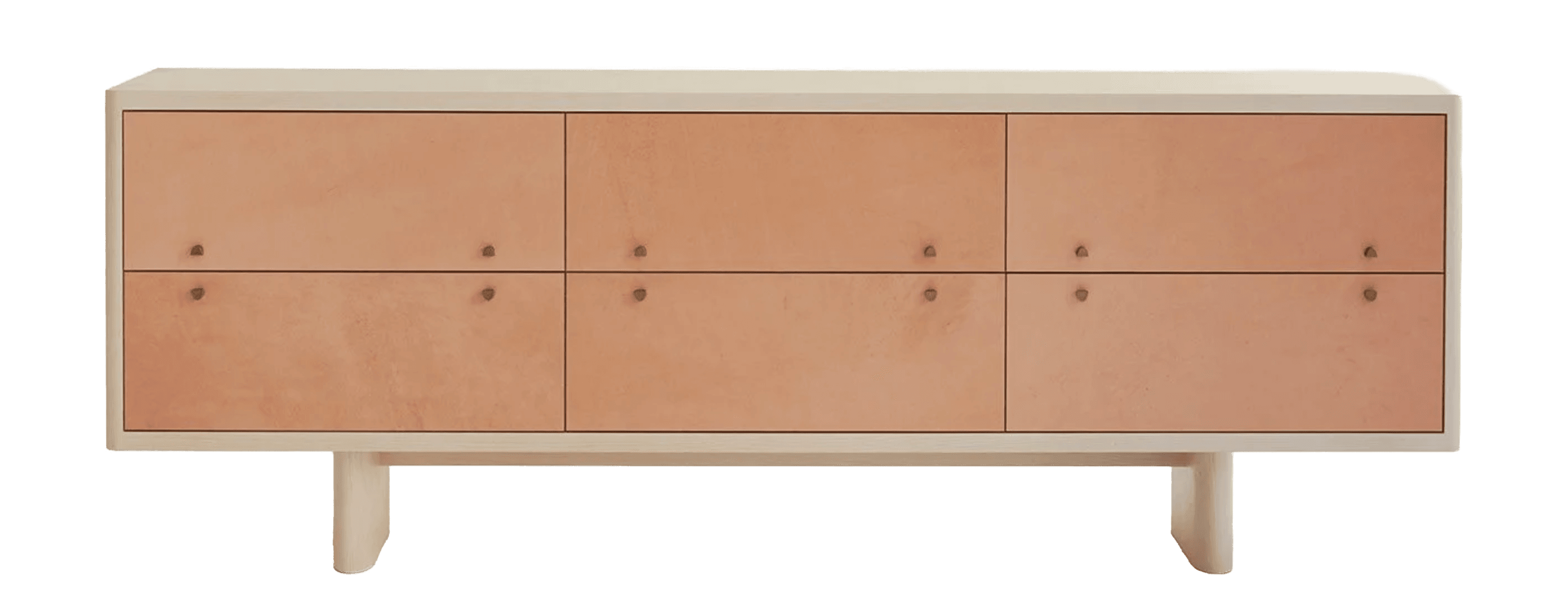 A long, low rectangular storage unit featuring a light wood frame and six pale peach-colored front panels, each adorned with two small brass-toned knobs. The unit stands on two substantial, recessed block legs. — 3D model