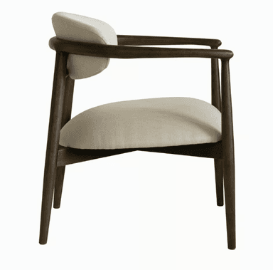 A wooden armchair with upholstered seat and backrest. The armchair features a curved, open back design and curved armrests. The legs are tapered and angled, providing a stable base. The upholstery is a light, neutral fabric. — 3D model