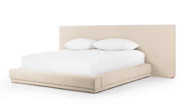 A modern upholstered platform bed featuring a clean, minimalist design. The entire frame, including the tall, rectangular headboard and the low-profile base, is covered in a light beige, textured fabric. The bed is designed to support a mattress without the need for a box spring. — 3D model