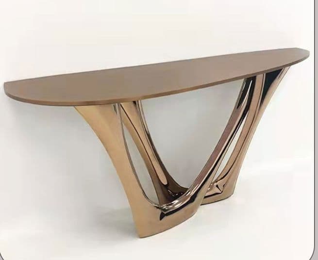 A console table with a semi-oval top and a distinctive base. The top appears to be a flat surface with a slight curve. The base consists of multiple curved, flowing supports that converge and diverge, creating an open, sculptural form. The overall design is modern and artistic. — 3D model