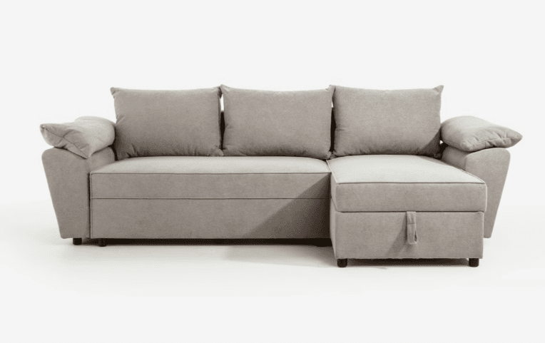 A modern gray fabric sectional sofa with a right-hand chaise lounge. It features three large back cushions and two small armrest cushions. The chaise has a visible pull-tab, indicating a potential pull-out bed mechanism or storage compartment. The sofa is upholstered in a textured gray fabric and stands on short, discreet black feet. — 3D model