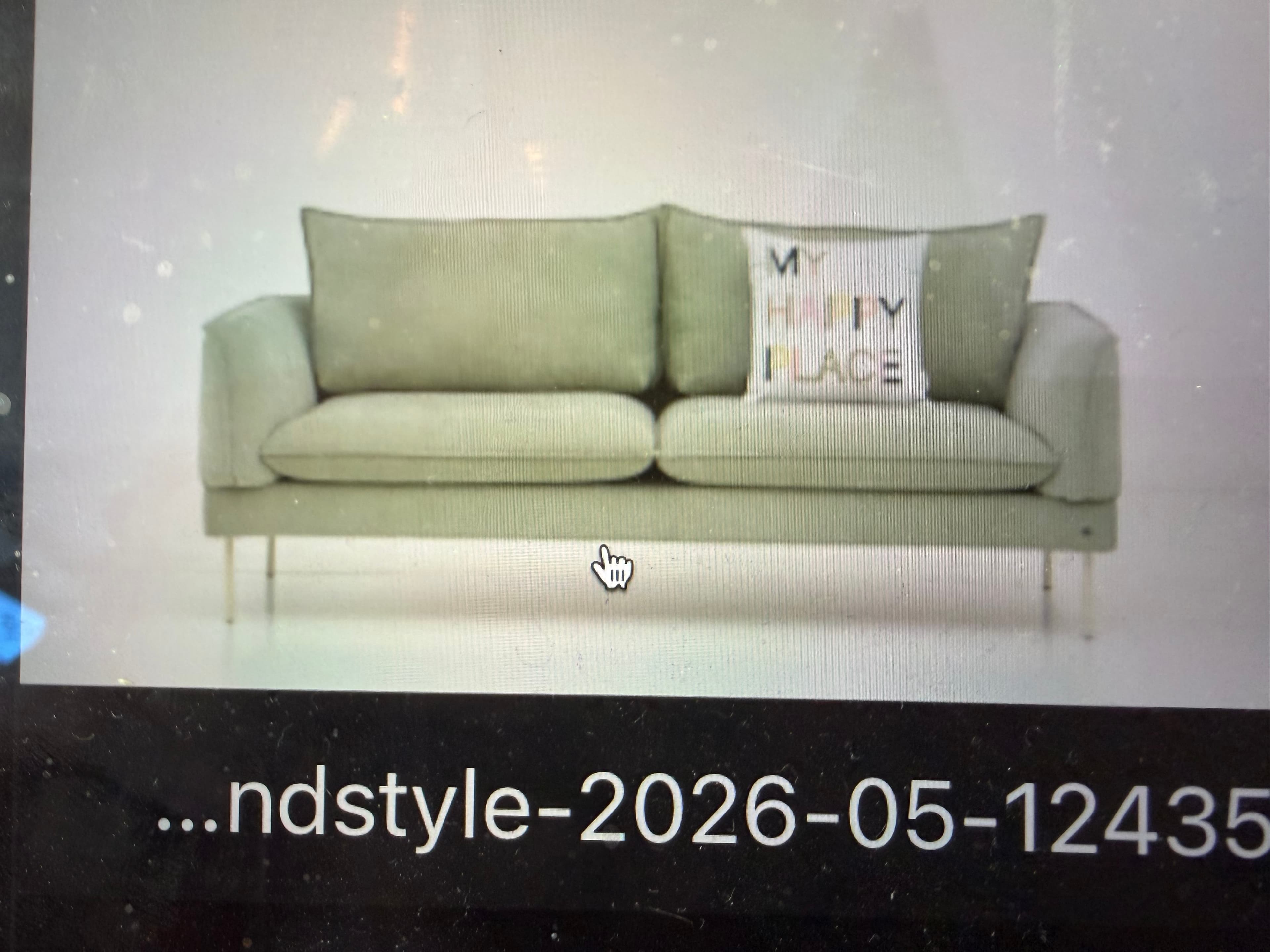 A modern two-seater sofa upholstered in a light green fabric, featuring clean lines, low track arms, and slender light-colored metal legs. It includes two back cushions, two seat cushions, and one decorative throw pillow with text. — 3D model