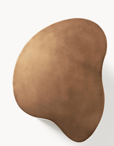 A bronze-toned metal accent table featuring an organic, undulating silhouette. — 3D model