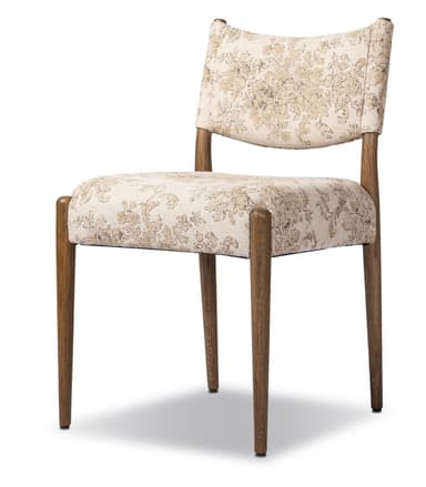 A side chair with a wooden frame and upholstered seat and back. The upholstery features a textured, floral pattern in beige and cream tones. The chair has four tapered wooden legs and a gently curved backrest. — 3D model