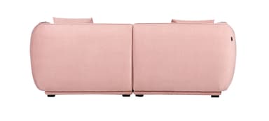 A two-seater sofa upholstered in a textured pink fabric. It features rounded armrests and back cushions, with two square throw pillows placed on top of the backrest. The sofa has a low profile with dark, almost invisible feet. — 3D model