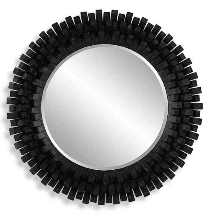 A striking round wall mirror featuring a unique, three-dimensional frame constructed from numerous short, rectangular wooden blocks. These blocks are arranged radially, projecting outwards, creating a textured, spiky, or sunburst-like effect. The wood is finished in a matte black color, providing a modern and sculptural aesthetic to the reflective surface. — 3D model