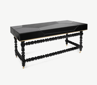 A rectangular accent table featuring an eclectic design with a high-gloss black lacquered top composed of geometric facets and a central matte panel. The table is supported by four ornate, turned wooden legs with bobbin-like patterns, also finished in high-gloss black. Subtle gold-finished accents are present at the junctures of the legs and tabletop, and at the feet. — 3D model