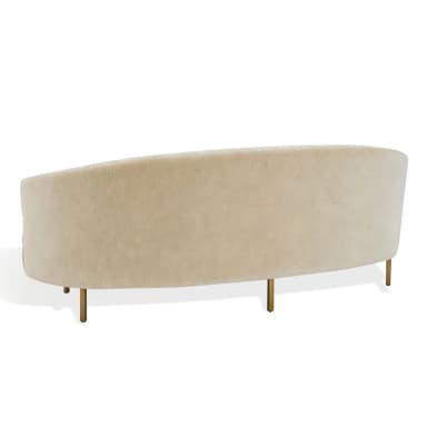 A contemporary curved sofa, viewed from the back, featuring a continuous rounded silhouette. It is upholstered in a light, neutral-toned fabric, possibly a boucle or similar textured material. The sofa is supported by four slender, tapered metal legs with a brass or gold finish, providing a minimalist and elegant foundation. — 3D model
