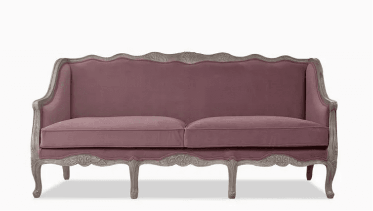 A French Provincial style loveseat featuring a carved wooden frame with a distressed finish and mauve fabric upholstery, designed to seat two people. — 3D model
