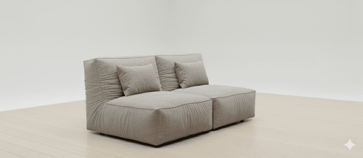 A modular two-seater sofa with a low profile and plush cushions. The sofa features a contemporary design with soft, rounded edges and prominent stitching along the seams. It is upholstered in a textured, light-colored fabric and includes two back cushions. The sofa appears to be composed of two individual seating modules placed side-by-side. — 3D model