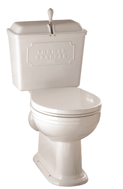 A vintage white toilet with a high-level cistern. The cistern has a rectangular shape with a raised decorative panel on the front, displaying the embossed text 'THOMAS CRAPPER'. A lever mechanism is visible on the top of the cistern. The toilet bowl is standard in shape, and the overall piece appears to be made of porcelain. — 3D model