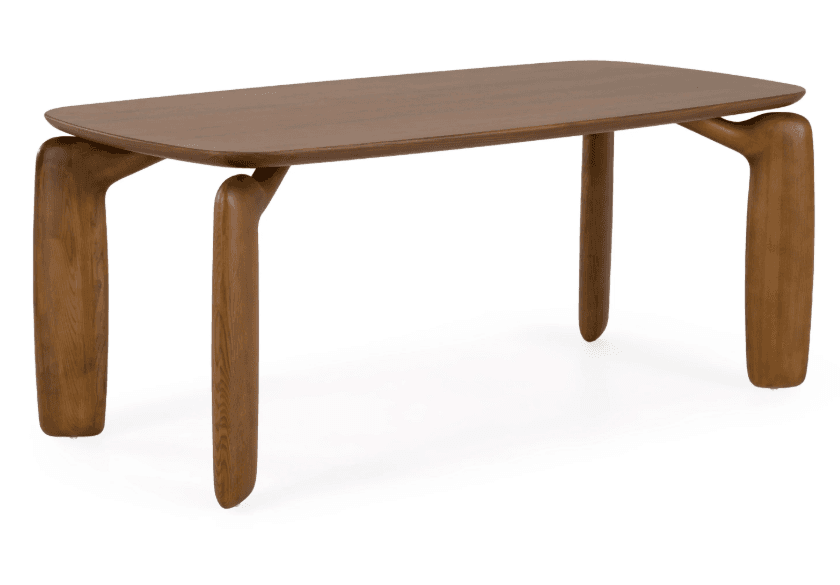 A rectangular wooden table featuring a gently rounded tabletop and distinctively sculptural, organically shaped legs. The legs are thick, curved, and appear to seamlessly merge with the underside of the top, presenting a monolithic and artistic aesthetic. — 3D model