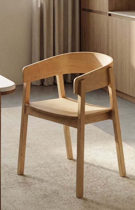 A minimalist dining chair crafted from light-toned solid wood, featuring a gracefully curved backrest that seamlessly integrates into short armrests. The seat is a subtly contoured wooden panel. The chair stands on four straight, square-profile legs, giving it a stable and contemporary appearance suitable for dining or accent use. — 3D model