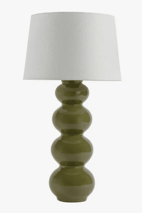 A table lamp featuring a stacked bobble-shaped ceramic base in an olive green glossy finish, topped with a plain white tapered drum fabric shade. — 3D model