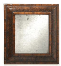 A square wall mirror featuring a substantial, stepped wooden frame with a rich, intricate burl wood grain. The mirror glass exhibits significant signs of age, including silvering deterioration and oxidation spots, contributing to an antique aesthetic. The frame itself appears in good condition, highlighting the natural beauty and pattern of the wood. — 3D model