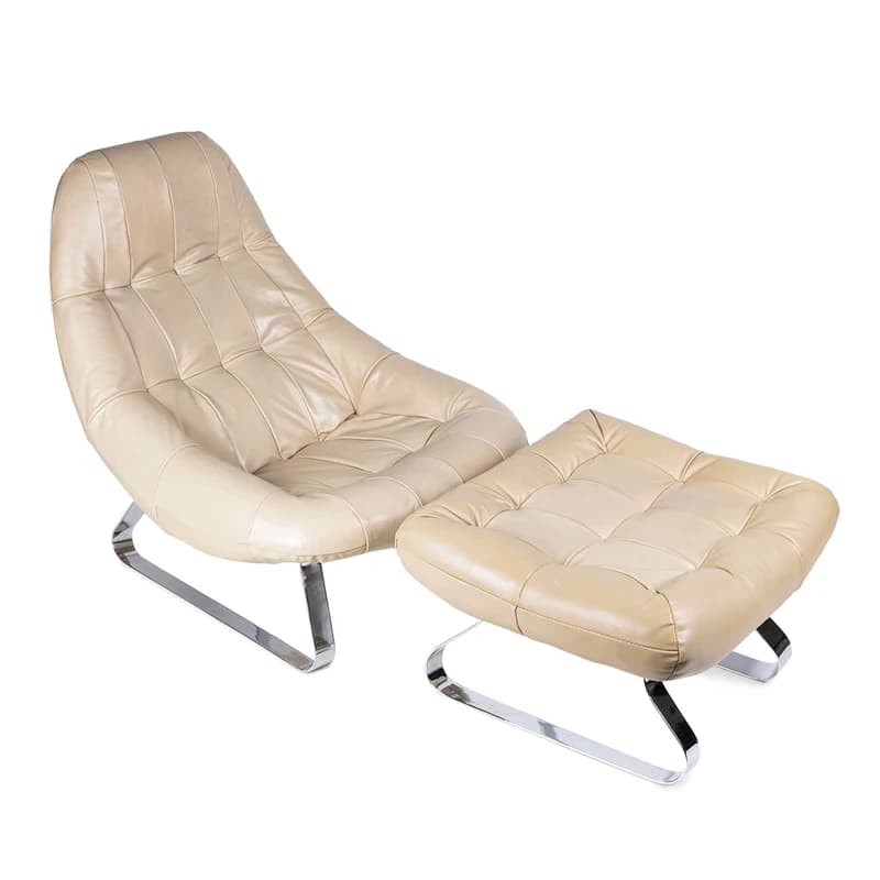 A mid-century modern lounge chair and matching ottoman, both featuring a deeply tufted upholstery in a light beige or cream-colored leather or faux leather. The chair has a reclined, ergonomic form with a curved backrest and seat, while the ottoman is a rectangular, cushioned footrest. Both pieces are supported by sleek, U-shaped chrome sled bases, giving them a floating appearance. The upholstery shows some natural creasing indicative of use and material characteristics. — 3D model