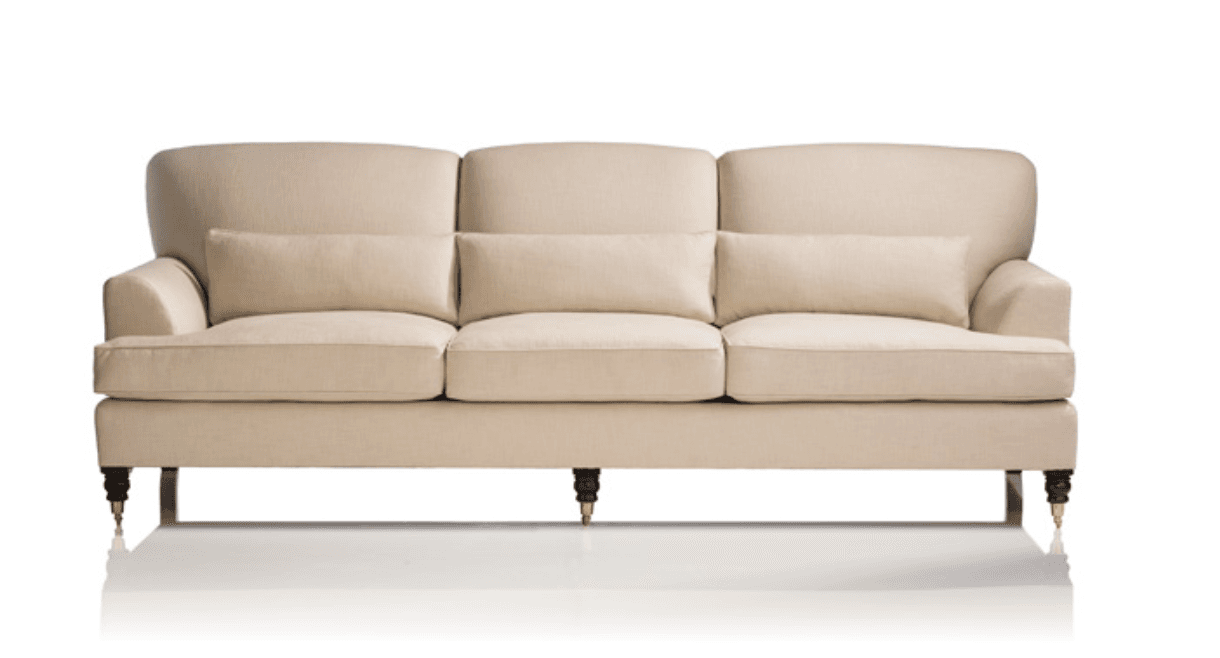 A three-seater sofa with a light beige linen upholstery. It features a slightly curved back, rolled armrests, and three separate cushions on the seat. The sofa rests on dark brown wooden legs with brass or gold-colored ferrules (caps at the bottom). The overall style is traditional or classic. — 3D model