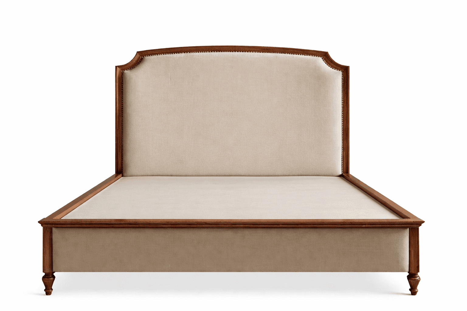 A wooden bed frame featuring an upholstered headboard and footboard. The headboard has a curved, architectural silhouette, outlined by decorative nailhead trim along its wooden frame. The bed frame itself is constructed of wood and has upholstered side rails and a footboard that matches the headboard's upholstery. It stands on four turned wooden legs. — 3D model